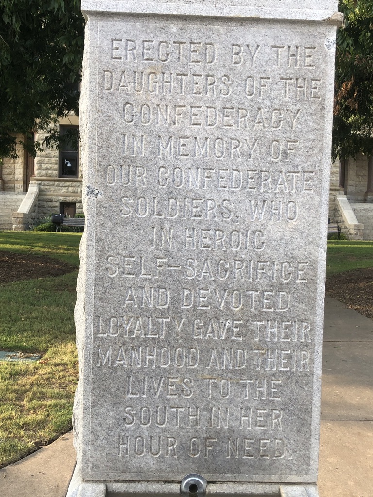 An inscription on a confederate soldier statues in the denton, Texas town square.
